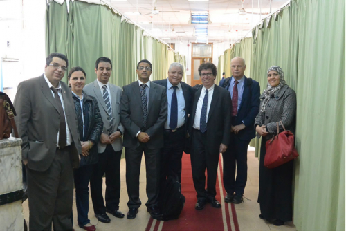 Neurology leadership from Cairo University lead WFN site visitors on tour of a hospital ward.