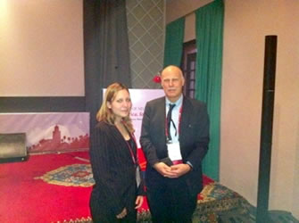 Professor Wolfgang Grisold chatting with a student at WCN 2011