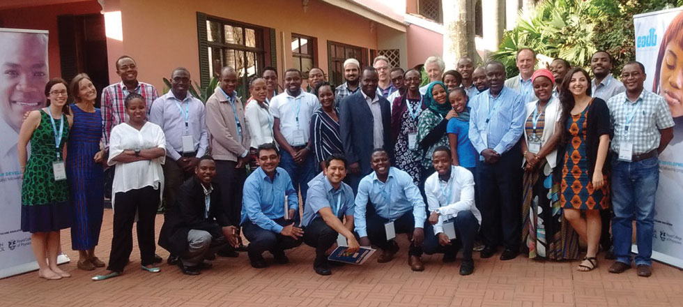 Group photo of course trainees, lecturers, and organizers.