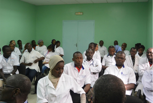 Neurology residents at the University of Dakar in a feedback session withWFN site visitors.