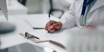 IStock 2150133538 Doctor Writing
