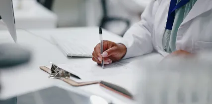 IStock 2150133538 Doctor Writing