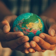 iStock 1368023303 Child holding globe