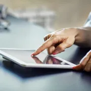 IStock 1033783576 Doctor Checking Tablet