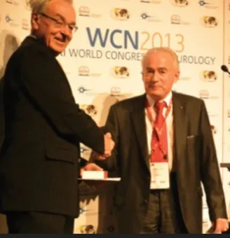 Prof. Johann Aarli receiving the WFN Medal for Service to International Neurology in 2013